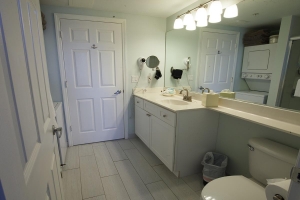 G Suite bathroom with shower and laundry